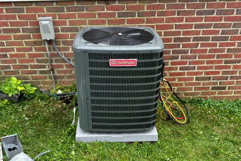 A photo of an outdoor A/C unit for spring home maintenance.